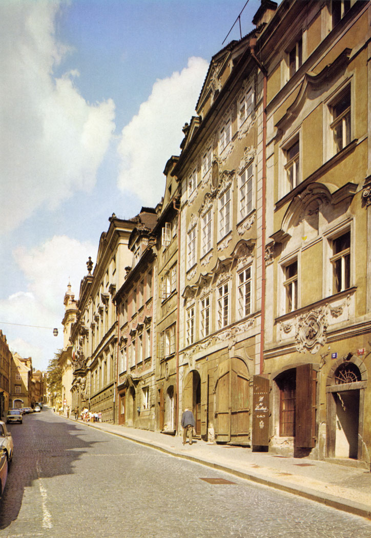 Neruda Street has kept its eighteenth century character to the present day, both in the predominance of High Baroque in the house fronts, house-signs and portals and in the optical symmetry of buildings typical of Prague Baroque.
