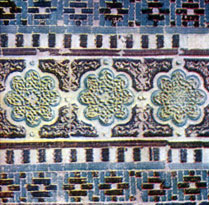 A detail of a border of the main fagade of Emir Burunduk mausoleum. Carved glazed terracotta. 14th century