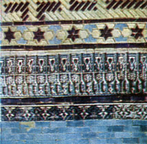 A fragment of the decoration of Usto Alim Nesefi mausoleum. The stalactite band and brick mosaic. 14th century